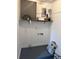 Small unfinished storage area with shelving and outlet at 1735 Boone Hall Dr # K6, Charleston, SC 29407