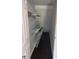 Under the stairs storage features wire shelving and dark wood-look flooring at 1735 Boone Hall Dr # K6, Charleston, SC 29407