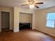 Bedroom features hardwood floors, a ceiling fan, closet and a built in dresser at 18808 Round O Rd, Round O, SC 29474