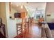 Cozy kitchen with bar seating and stainless appliances, connected to the living room area at 192 Ashley Ave # C, Charleston, SC 29403