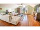 Inviting living room featuring hardwood floors, comfortable seating, and a large window at 192 Ashley Ave # C, Charleston, SC 29403