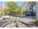 Parking lot shared by the condominiums and townhouses, with space for multiple vehicles at 192 Ashley Ave # C, Charleston, SC 29403