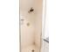 Clean and bright tiled shower with a rainfall showerhead and glass enclosure at 192 Ashley Ave # C, Charleston, SC 29403