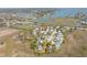 Aerial view of home set in a coastal community near marshland and waterways at 2107 Club View Ct, Charleston, SC 29412