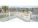 Spacious deck with white railings offering neighborhood views and plenty of natural light at 2107 Club View Ct, Charleston, SC 29412