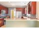 Kitchen with cherry cabinets, granite countertops, and stainless steel appliances at 2107 Club View Ct, Charleston, SC 29412