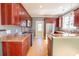 Spacious kitchen featuring stainless steel appliances and warm wood cabinetry at 2107 Club View Ct, Charleston, SC 29412
