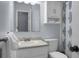 Bathroom featuring a white vanity sink, a large mirror with medicine cabinet, and a shower curtain at 211 Bramblewood Dr, Summerville, SC 29485