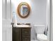 Bathroom featuring a vanity sink with dark wood cabinets, a large mirror, and a toilet at 211 Bramblewood Dr, Summerville, SC 29485