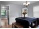 Inviting dining space featuring wood floors, neutral walls, and seamless flow into the kitchen at 211 Bramblewood Dr, Summerville, SC 29485