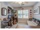 Bright bedroom with a comfortable seating area and a view of the outdoors at 2154 Country Manor Dr Dr, Mount Pleasant, SC 29466