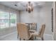 Charming breakfast nook with a decorative chandelier, natural light, and seating for four at 2154 Country Manor Dr Dr, Mount Pleasant, SC 29466