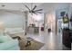 Open-concept living space with views of the kitchen and entry featuring tile floors and neutral colors at 2154 Country Manor Dr Dr, Mount Pleasant, SC 29466