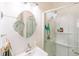 Bright bathroom with a white sink and a shower featuring modern fixtures at 21785 Lowcountry Hwy, Ruffin, SC 29475