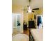 Inviting bedroom featuring a ceiling fan, original wood flooring, and an antique dresser at 21785 Lowcountry Hwy, Ruffin, SC 29475
