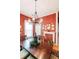 Dining room with wooden table, decorative fireplace and light fixture at 21785 Lowcountry Hwy, Ruffin, SC 29475