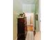 Hallway with vintage-style wooden dresser and access to the main area at 21785 Lowcountry Hwy, Ruffin, SC 29475