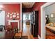 Dining room leads to hallway with sofa and vintage decor, seamlessly blending spaces at 21785 Lowcountry Hwy, Ruffin, SC 29475