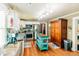 Kitchen featuring stainless steel appliances, island table, and wood floors at 21785 Lowcountry Hwy, Ruffin, SC 29475