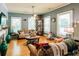 Charming living room featuring hardwood floors, a decorative fireplace, and a cozy seating area at 21785 Lowcountry Hwy, Ruffin, SC 29475
