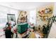 Cluttered storage room with multiple windows, shelving, toys, and other stored items at 21785 Lowcountry Hwy, Ruffin, SC 29475