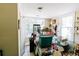 Cluttered storage room with multiple windows, shelving, toys, and other stored items at 21785 Lowcountry Hwy, Ruffin, SC 29475