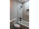 The updated bathroom features new tile, modern fixtures, and a recessed storage shelf at 227 Amy Dr, Goose Creek, SC 29445