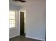 Bedroom with neutral walls, new flooring, and a painted black interior door at 227 Amy Dr, Goose Creek, SC 29445