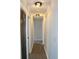 This hallway includes hardwood flooring, overhead lighting, and a closet for storage at 227 Amy Dr, Goose Creek, SC 29445