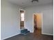 Freshly painted living room offers modern vinyl floors with view to bright room via decorative steps at 227 Amy Dr, Goose Creek, SC 29445
