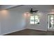 Bright and airy living room featuring updated flooring, fresh paint, and natural light pouring through a large window at 227 Amy Dr, Goose Creek, SC 29445
