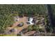 Aerial view of a home surrounded by trees and outlining the property line at 2300 Bethera Rd # B, Bonneau, SC 29431