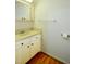 Bathroom featuring hardwood floors and vanity with a sink and drawers at 2300 Bethera Rd # B, Bonneau, SC 29431