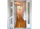 Inviting entryway featuring gleaming hardwood floors and decorative glass accents at 2300 Bethera Rd # B, Bonneau, SC 29431