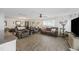Spacious living room with plush seating, a ceiling fan, and ample natural light. Ready to enjoy at 254 Cypress Marsh Rd, Moncks Corner, SC 29461