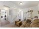 Upstairs loft offers a comfortable seating area, with lots of light at 254 Cypress Marsh Rd, Moncks Corner, SC 29461