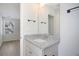 Well-lit bathroom with a granite countertop vanity, undermount sink, and chrome hardware at 2606 Bennett Yard Rd, North Charleston, SC 29405