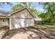 Detached two-car garage offering ample space for parking and storage at 2919 Fernwood Dr, North Charleston, SC 29406