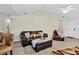Spacious living room area with plush sofas, ottoman, and ample seating at 2919 Fernwood Dr, North Charleston, SC 29406
