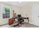 The office features a desk, chair, and a window, creating a bright and conducive workspace at 2919 Fernwood Dr, North Charleston, SC 29406