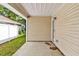 Inviting covered patio area, great for relaxing and enjoying the outdoors, with access to the backyard at 2919 Fernwood Dr, North Charleston, SC 29406