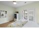 Inviting bedroom with French doors leading to outdoor space and a ceiling fan at 3019 Fraserburgh Way, Mount Pleasant, SC 29466