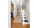Inviting entryway with staircase and hallway leading to bright living spaces at 3019 Fraserburgh Way, Mount Pleasant, SC 29466