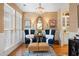 Cozy sitting area with decorative furnishings, chandelier, and natural light at 3019 Fraserburgh Way, Mount Pleasant, SC 29466