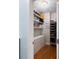 Well-organized walk-in closet features custom shelving and ample storage space at 3019 Fraserburgh Way, Mount Pleasant, SC 29466