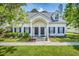 Inviting home featuring well-maintained lawn, tasteful shrubs, and covered entrance at 3084 Queensgate Way, Mount Pleasant, SC 29466