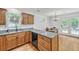 Well-equipped kitchen with granite countertops, stainless steel appliances and breakfast area at 3084 Queensgate Way, Mount Pleasant, SC 29466