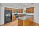 Spacious kitchen with granite countertops, stainless steel appliances, and ample cabinet space at 3084 Queensgate Way, Mount Pleasant, SC 29466
