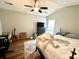 Bedroom with ceiling fan, window, desk, and a dresser at 310 Flyway Rd, Goose Creek, SC 29445