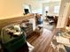 Bright bedroom with hardwood floors, though cluttered with moving boxes and other items at 310 Flyway Rd, Goose Creek, SC 29445